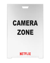 Load image into Gallery viewer, White A-frame sign reading CAMERA ZONE with a studio logo
