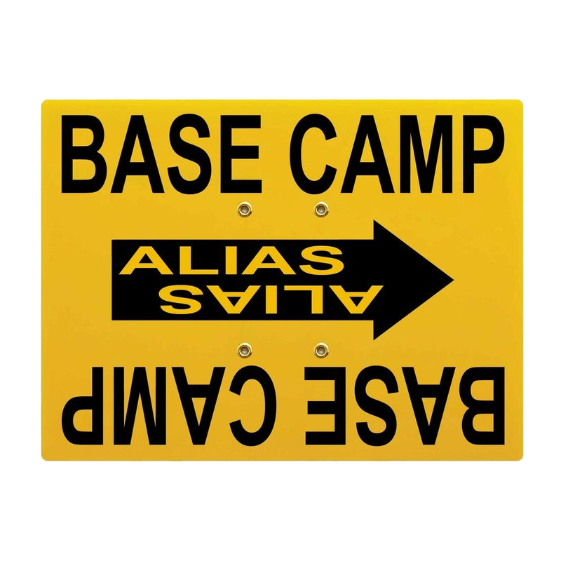 Yellow BASE CAMP sign with an ALIAS arrow