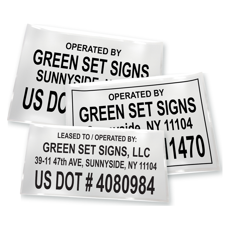 Three US DOT number decals stacked together